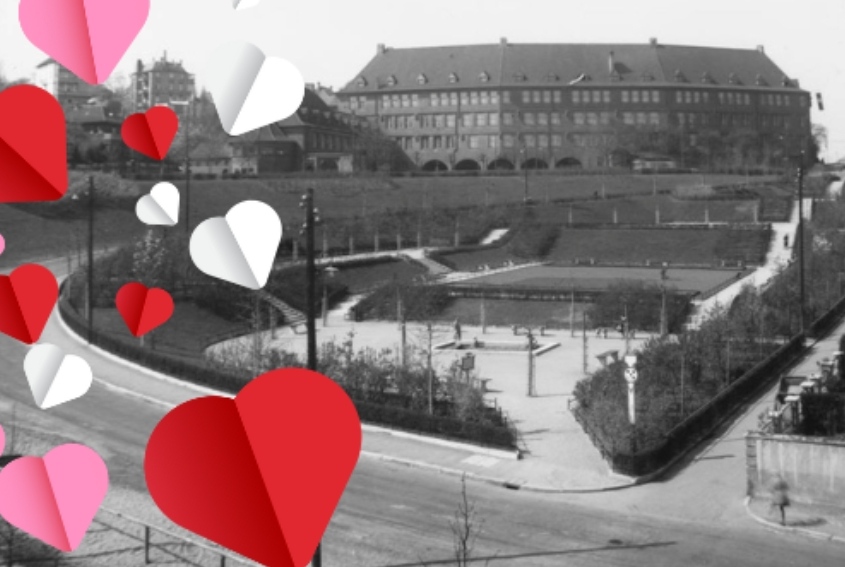 Schwarz-Weiß-Parkansicht mit großen roten und weißen Herzgrafiken im Vordergrund.